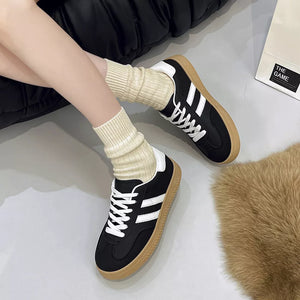 Round Toe Lace Up Sneakers in Black, model styling view