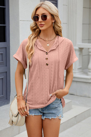 Perforated blush pink henley hooded tee with short sleeves and button detail.
