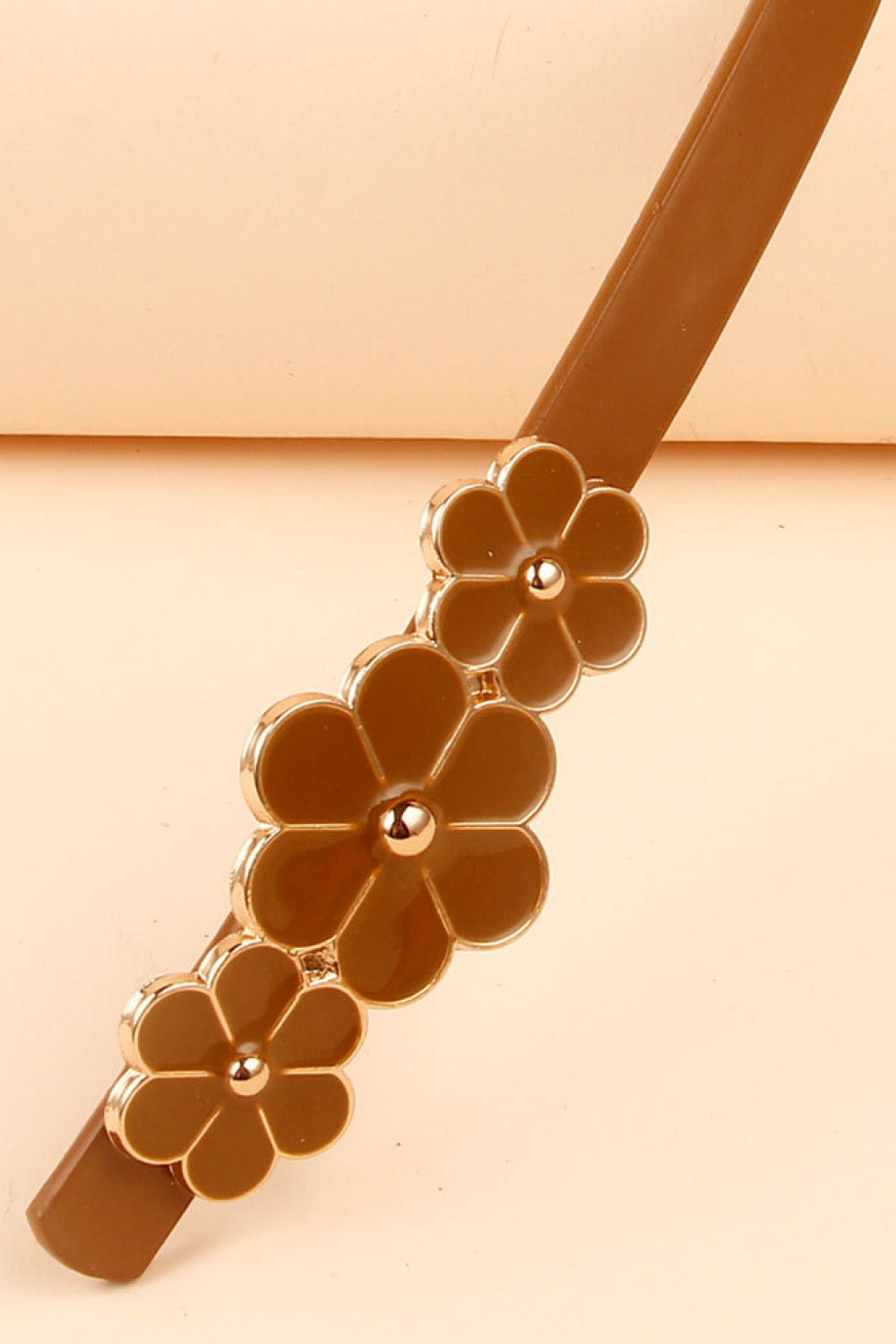 Caramel skinny belt with floral blossom accents