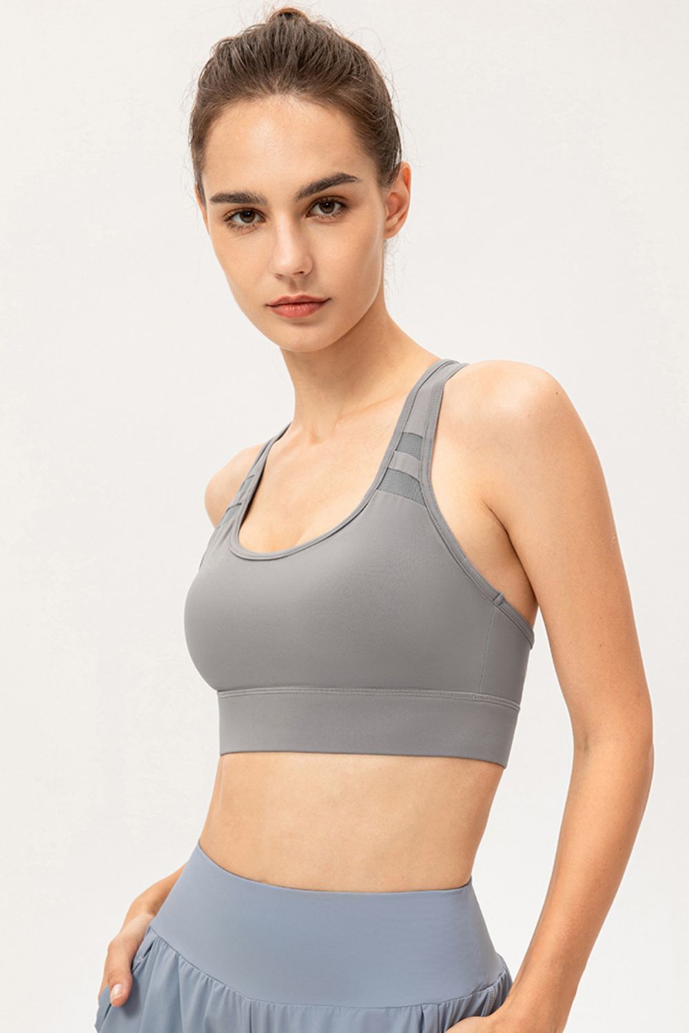 Light Gray mesh-inset performance sports bra with scoop neck and racerback straps.