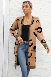 Khaki leopard motif knit cardigan with pockets and striped trim.