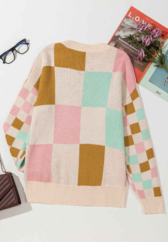 Colorblock checkerboard knit sweater in blush pink, beige, and mint green acrylic.