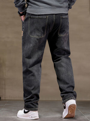 Black 100% cotton jeans with drawstring waist and visible back pockets.