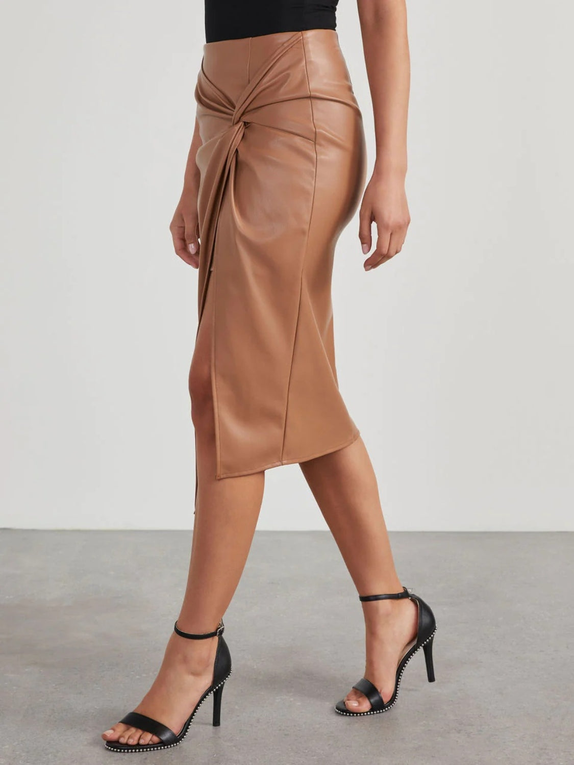Tan faux leather midi skirt with knot detail and side slit