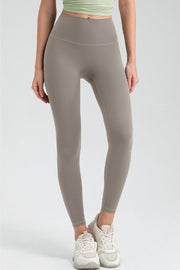 Taupe high rise leggings with a seamless waistband and full length legs.