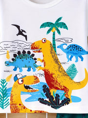 Baby tee with cartoon dinosaur adventure print, featuring palm trees and water.