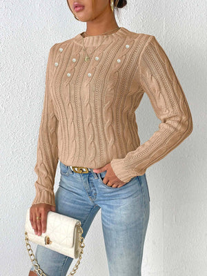 Camel cable knit sweater with pearl embellishments and crew neck.