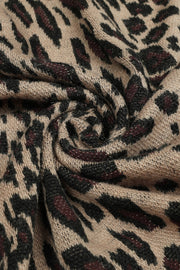 Beige leopard print knit cape with acrylic fabric detail
