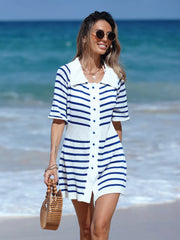 Blue and white striped knit mini dress with collar and buttons, styled casually on the beach.