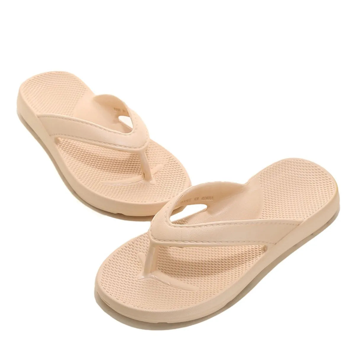 Textured rubber thong sandals in apricot with a waffle-patterned footbed.