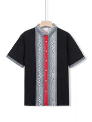 Black short sleeve men's shirt with bold geometric print and red stripe detail.