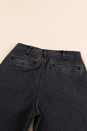 Dark wash denim wide-leg jeans with button-fly and back pockets.