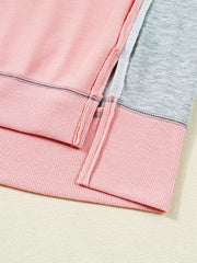 Oversized Dusty Pink sweatshirt with contrast stitching and side slits.