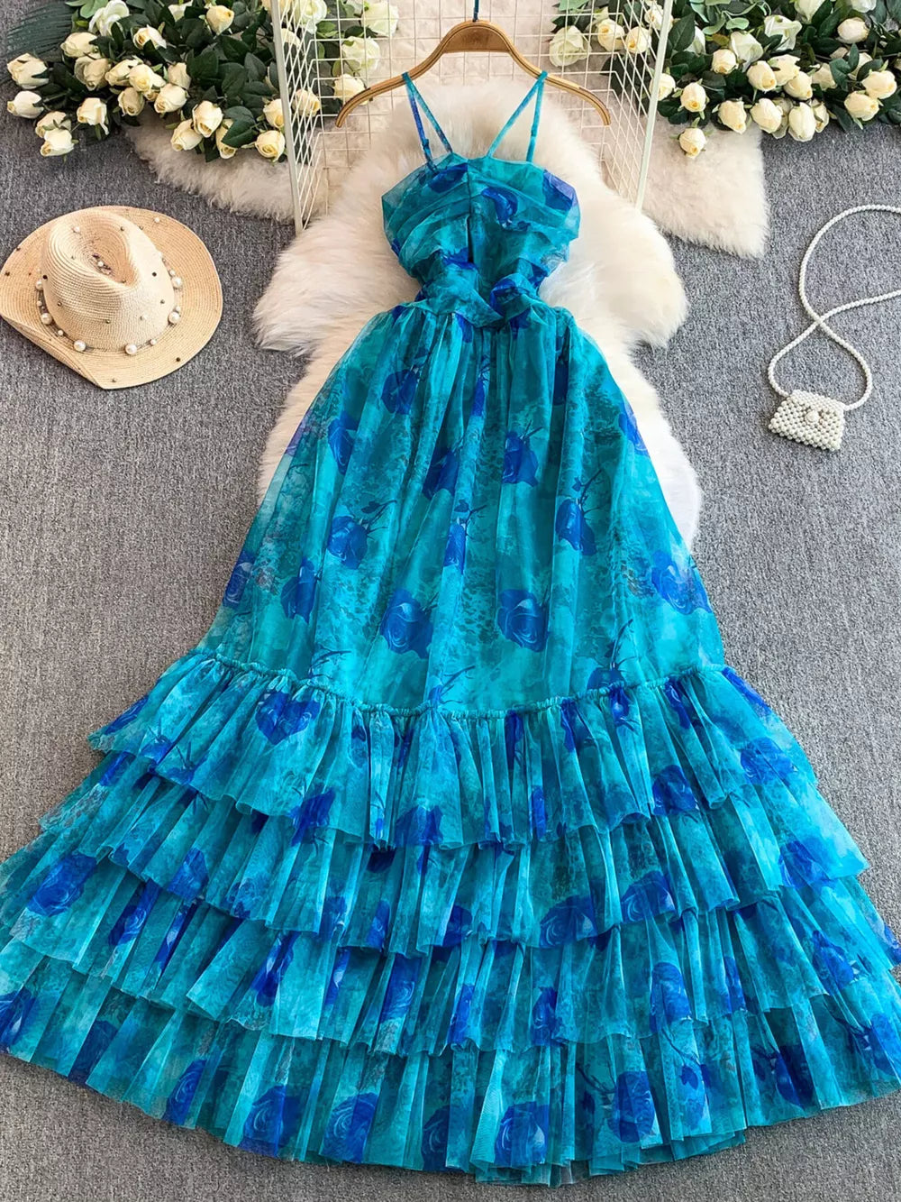 Blue floral mesh maxi dress with tiered ruffles and spaghetti straps
