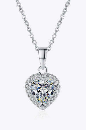 Silver heart cut halo pendant necklace with clear cubic zirconia on a sterling silver chain.