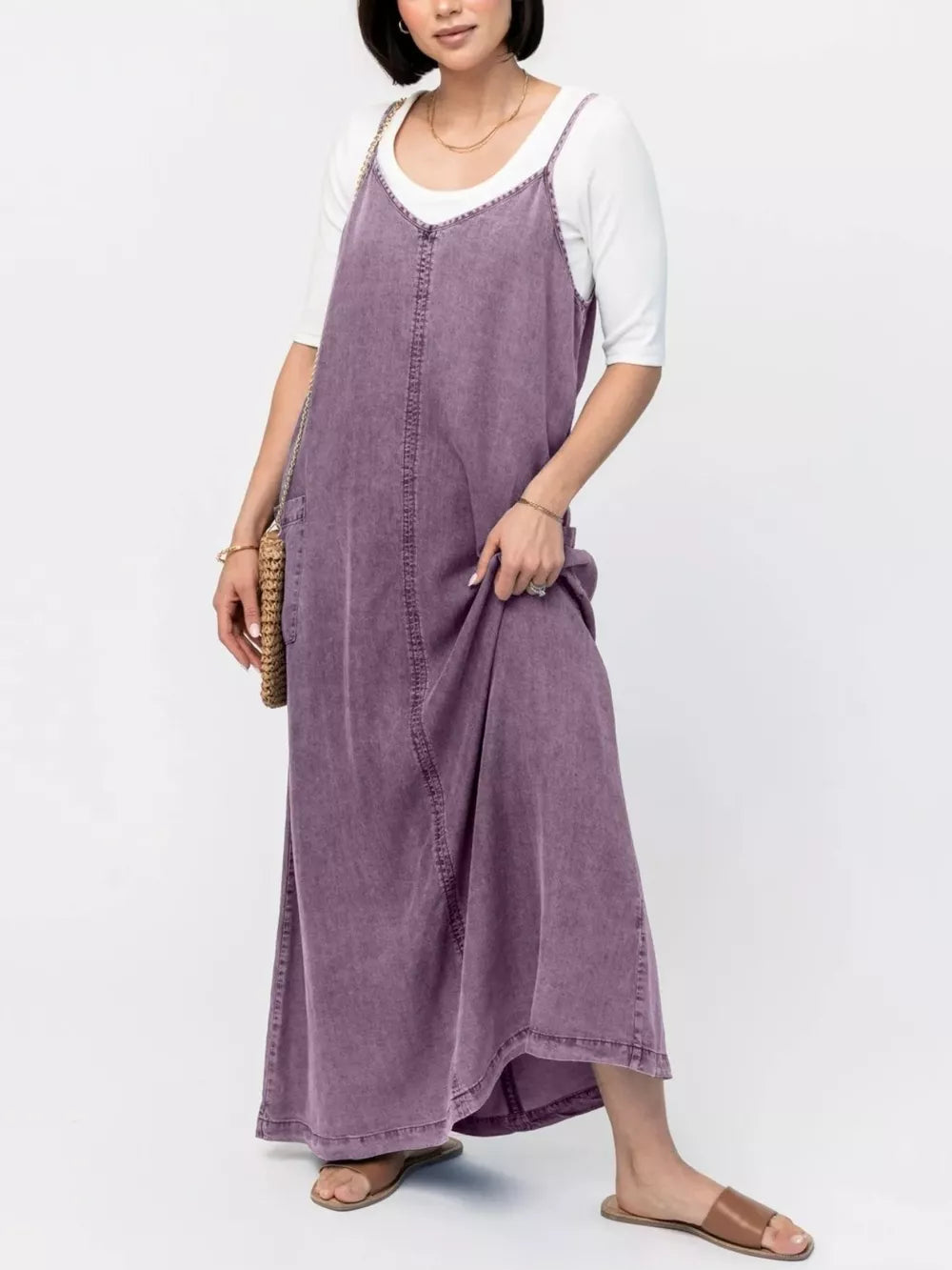 Gray Purple denim maxi dress with V-neck and adjustable straps, styled with a white tee.