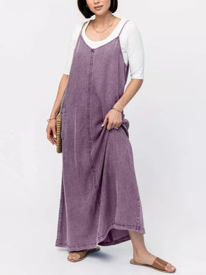 Gray Purple denim maxi dress with V-neck and adjustable straps, styled with a white tee.