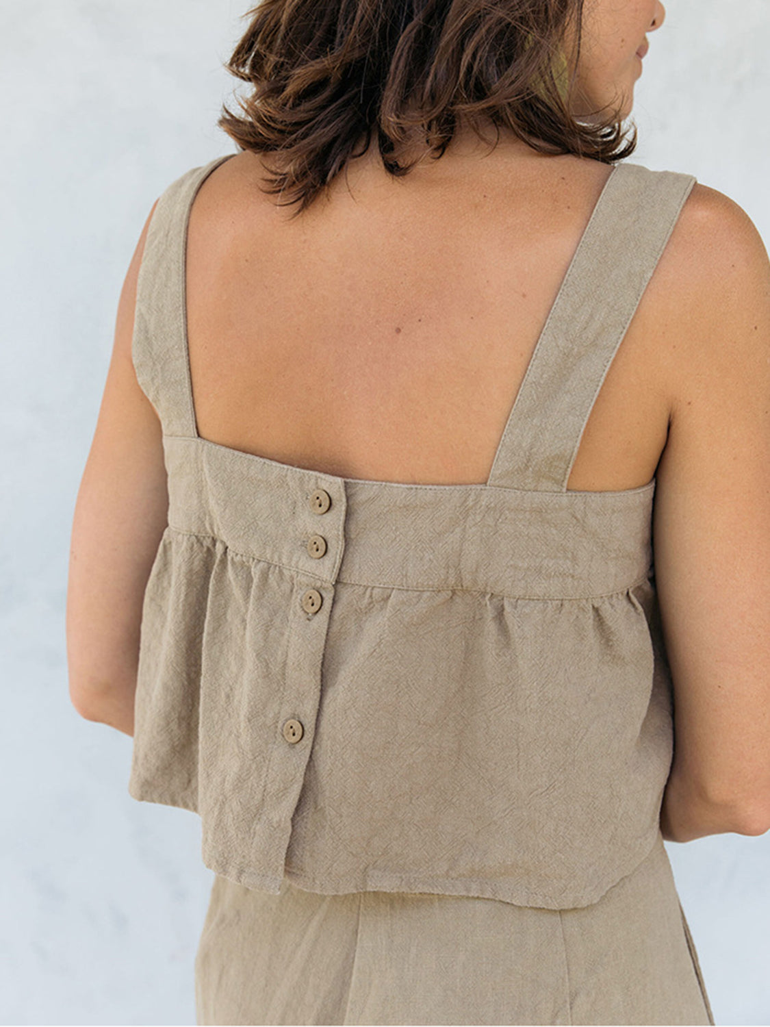 Khaki linen crop top with button front detail and culottes.