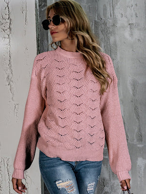 Blush pink openwork knit crew neck pullover sweater with balloon sleeves.