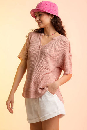Relaxed waffle knit top in Pale Blush with V-neck and chest pocket.
