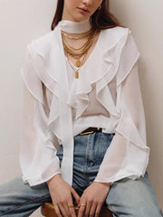 White chiffon blouse with V-neck, ruffle trim, and tie detail.
