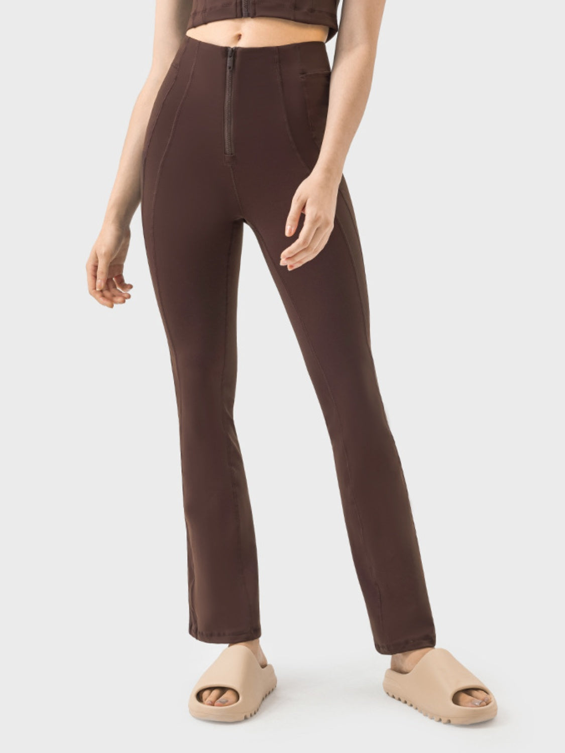 Sculpted flare active zip trousers in chocolate brown with a high waist and flared leg.