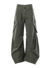 Textured paneled cargo pants in army green with a baggy fit and multiple pockets.