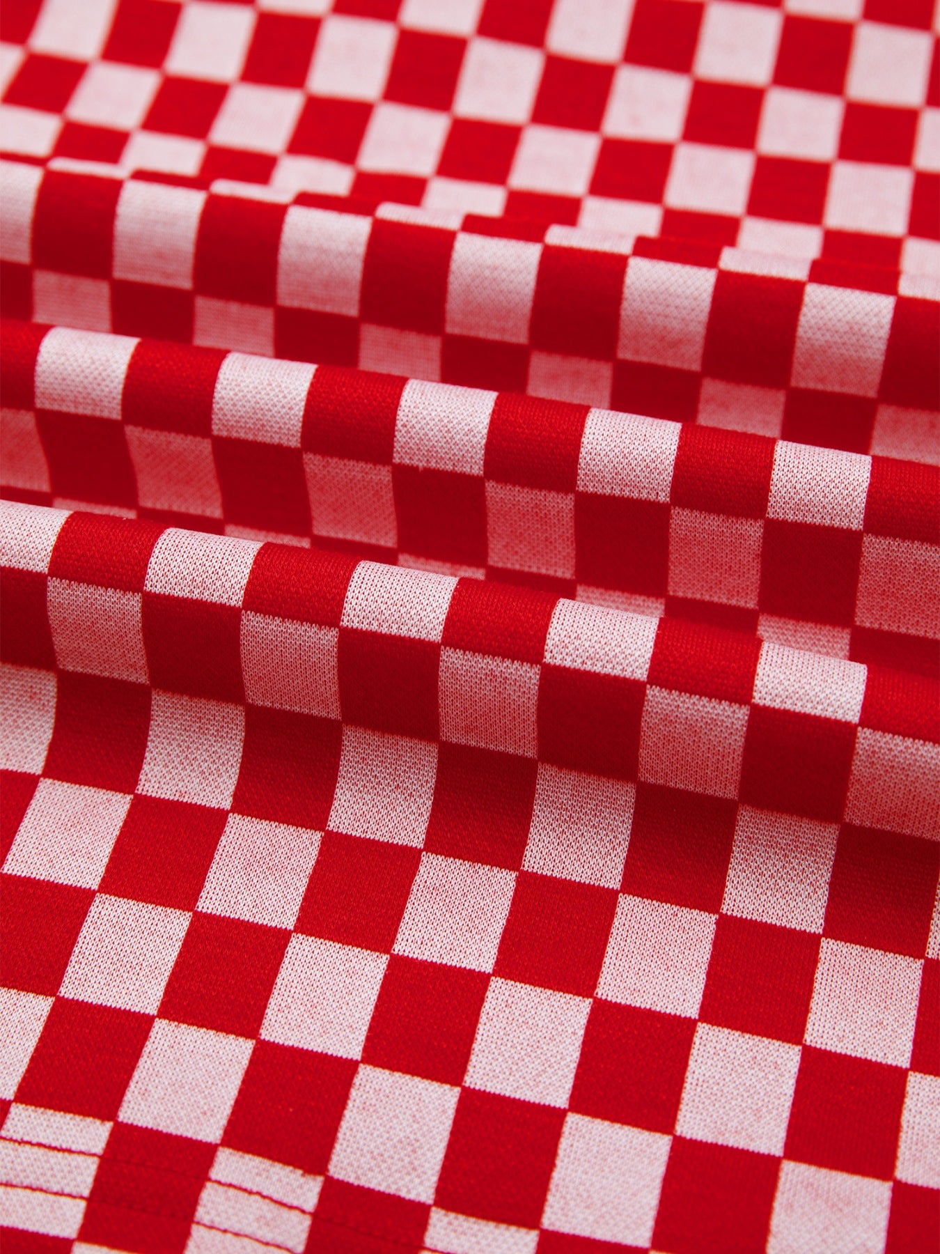 Red and white checkered print shirt with ruffle sleeves detail