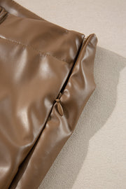 Brown faux leather mini skirt with knot detail and side zipper.