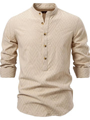 Khaki geo-embossed henley shirt with mandarin collar and buttoned placket.