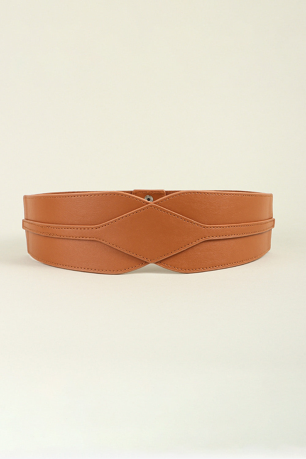 Caramel elastic waist belt with sculpted faux leather overlay and crisscross detail