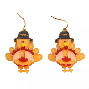 Thanksgiving turkey charm dangle earrings in acrylic with pilgrim hats.