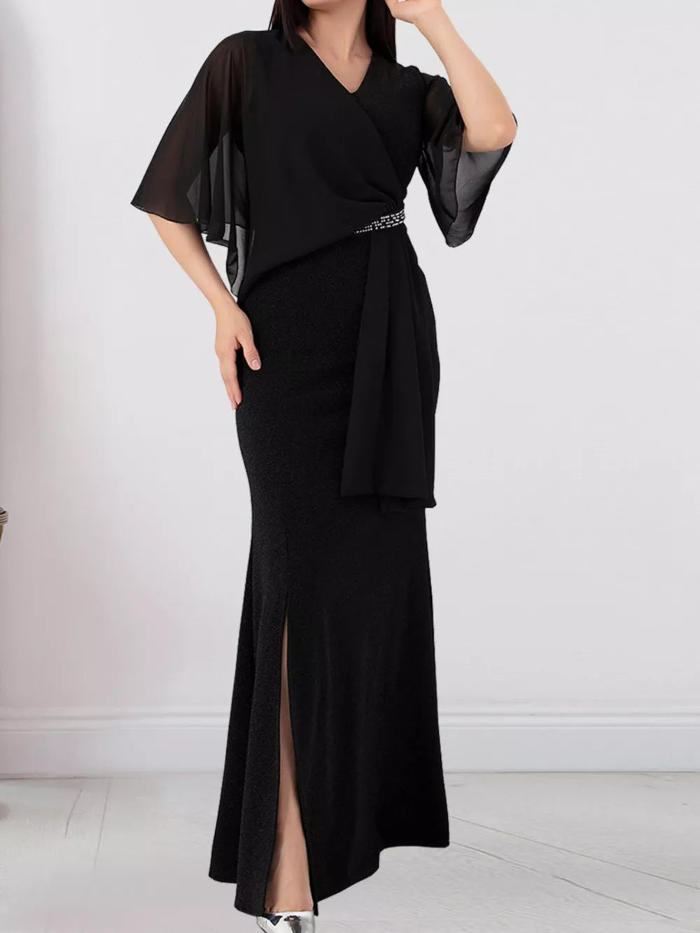 maxi dress in black featuring belted and sheath fit