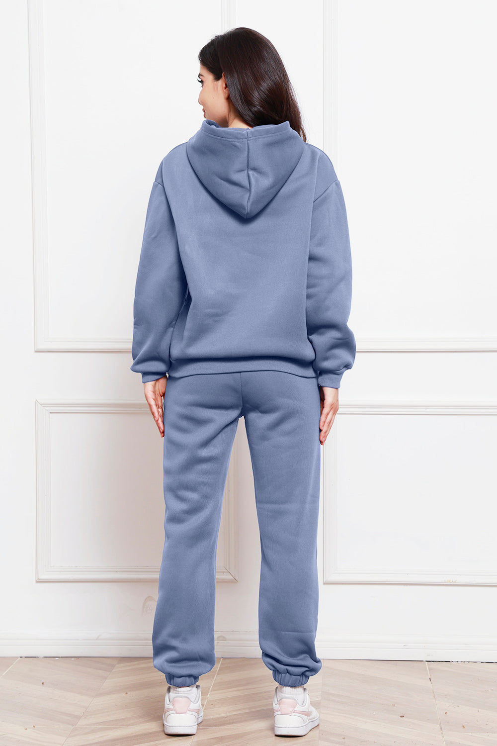 Light blue relaxed fit hoodie and joggers set with cuffed ankles.
