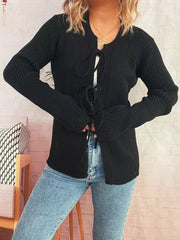 Black ribbed tie-front cardigan with cuffed sleeves and a round neckline.