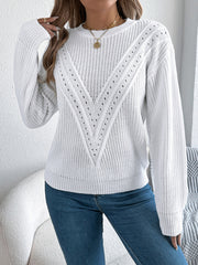 White chevron knit sweater with eyelet detail and crew neck