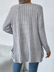Light gray ribbed knit cardigan with long sleeves and ruched side details.