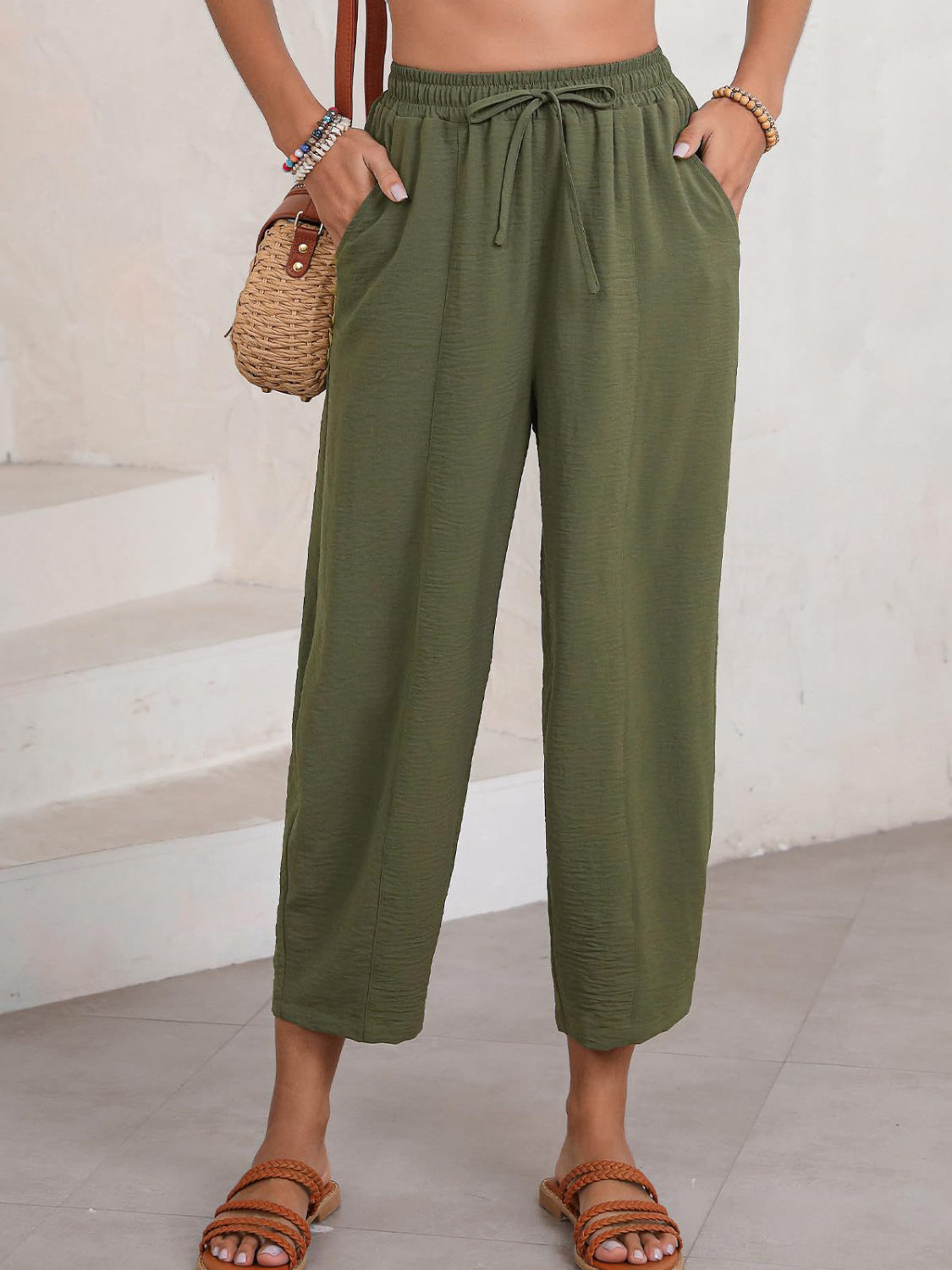 Textured seamed balloon crop trousers in Army Green with drawstring waist and pockets.