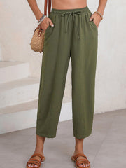 Textured seamed balloon crop trousers in Army Green with drawstring waist and pockets.