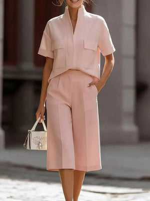 Blush pink two-piece set with pocketed top and wide-leg pants.