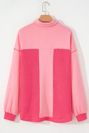 Blush pink shacket with waffle knit panels and a mock neck.