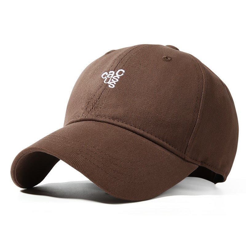 Coffee colored baseball cap with white embroidered logo and curved brim.