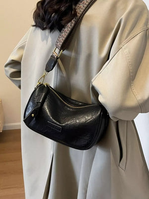 Wide Strap Crossbody Bag in Black, model styling view