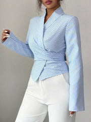 Striped long sleeve wrap blouse with a tie waist and V-neck.
