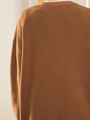 Ribbed knit cardigan in Ochre with balloon sleeves and button detail.
