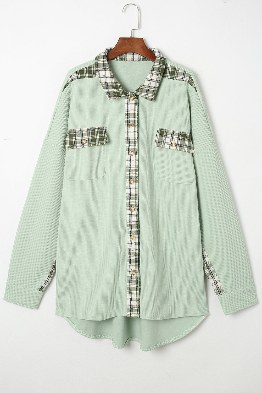 Light green waffle knit overshirt with plaid trim on collar, pockets, and cuffs.