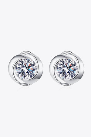 Silver halo crystal stud earrings with a swirling design