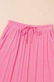 Pink ribbed co-ord skirt set with drawstring waist and pockets