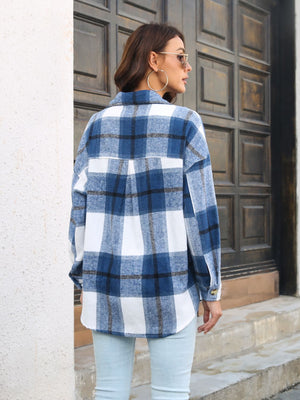 Oversized blue plaid shacket with gold buttons, casual outerwear.