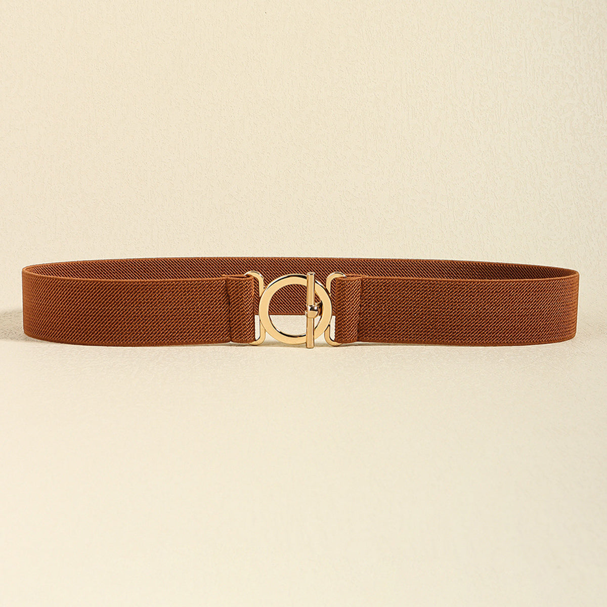 Caramel elasticated belt with gold circle buckle detail